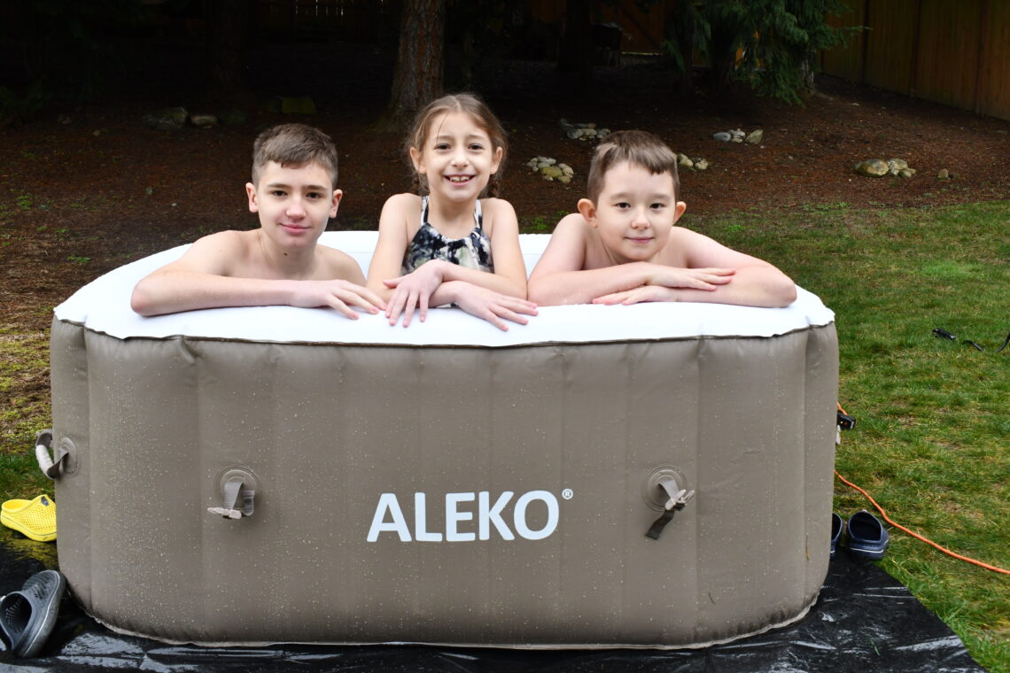 kids in inflatable hot tub