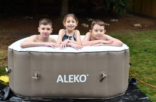 kids in inflatable hot tub