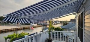 awning over deck by lake
