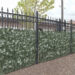 Steel fence with faux ivy fence screen