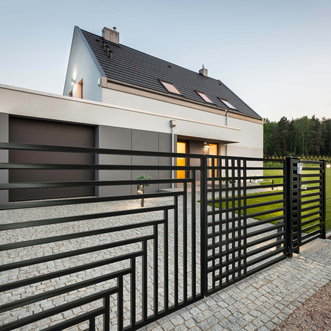 driveway gate with modern home